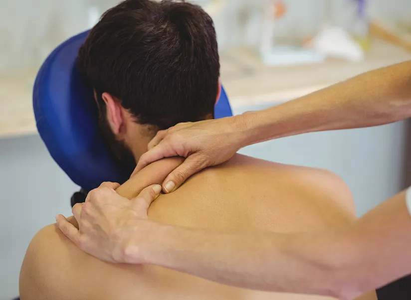 physiotherapist-giving-back-massage-patient