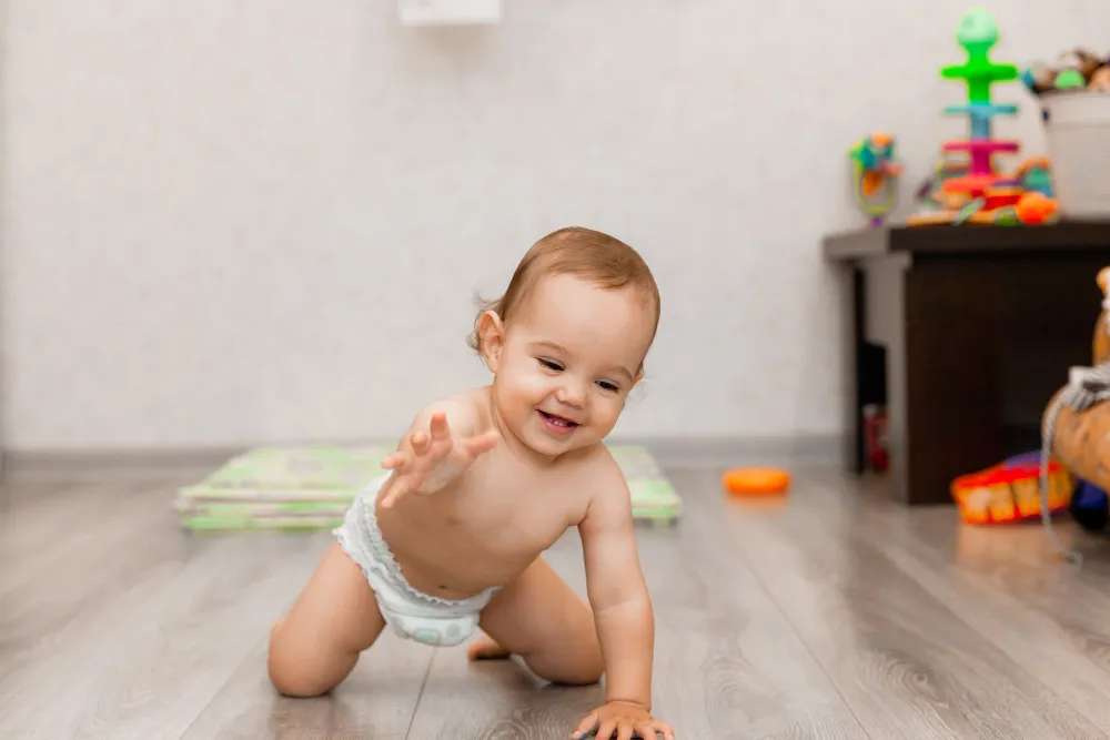 baby in a safe floor space